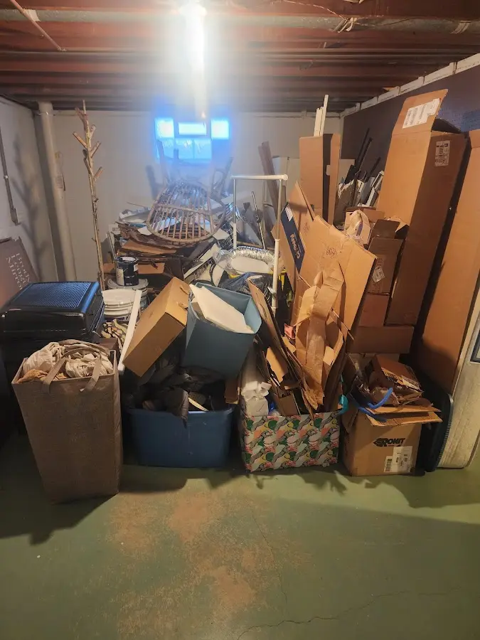 Roll-off dumpster container at job site for 6 Yard Dumpster Rental in Kalamazoo